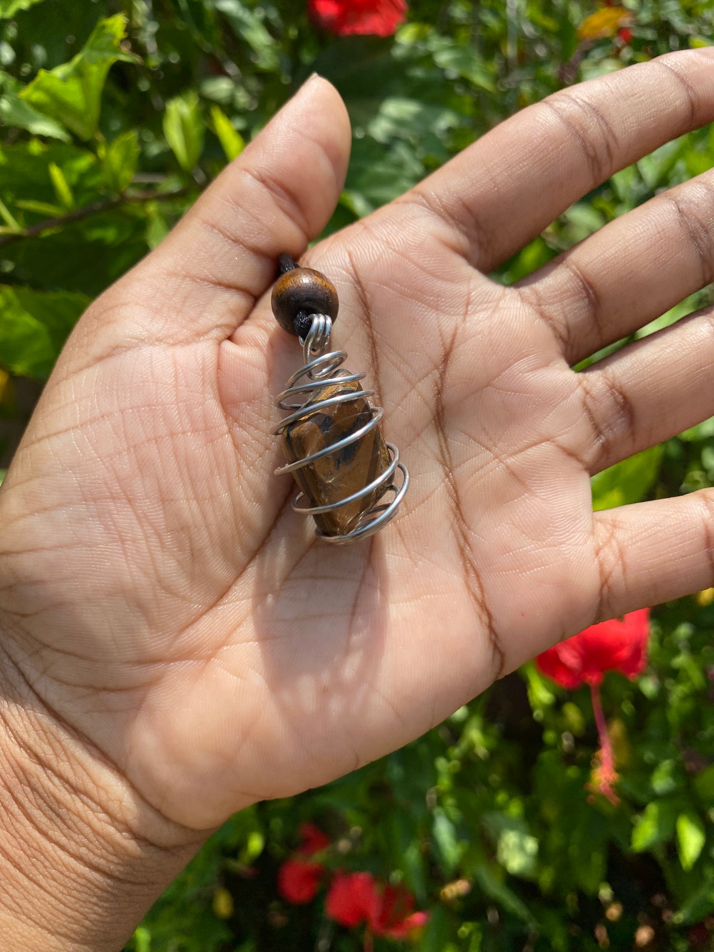 Tigers eye cage pendant